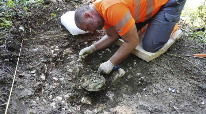 Swiss Metal Detectorist Finds 1,290 4th Century Roman Coins!