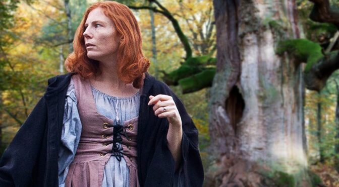 Ancient Celtic Woman in Fancy Clothes Buried in a Hollow Tree Trunk